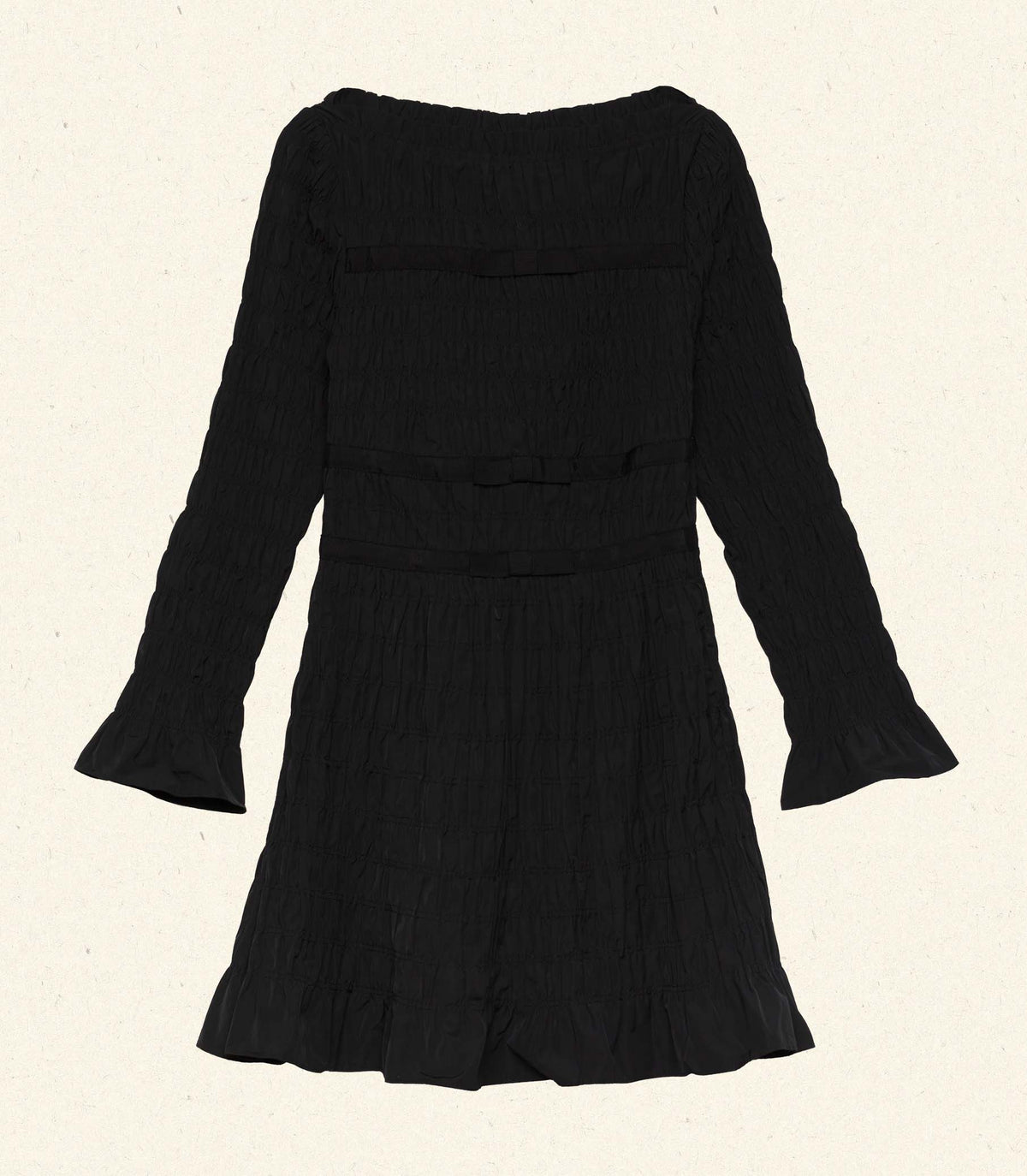 Flat lay of the Cecilia Dress in black with a ruffled hem, long sleeves, and fitted waist.