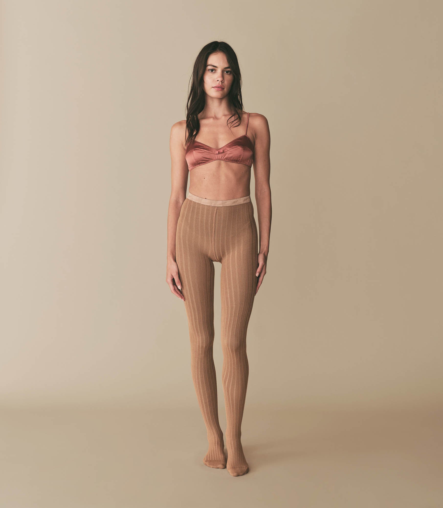 http://www.shopdoen.com/cdn/shop/files/COLLEGIEN-RIBBED-TIGHTS_CARAMEL-AU-BEURRE-SALE_01.jpg?v=1690913746