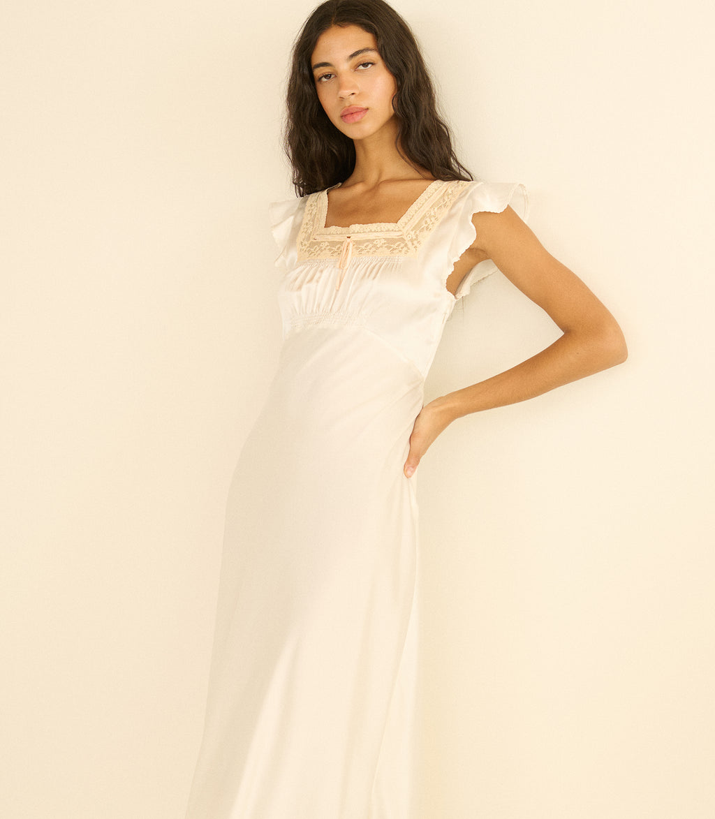 cesarina dress from den A night out with @champagnemani in our '90s-inspired DEN Heirloom Cesarina  Dressan Italian cotton velvet treasure   ~  Image  description // Imani wears a cap-sleeved black velvet sheath dress with