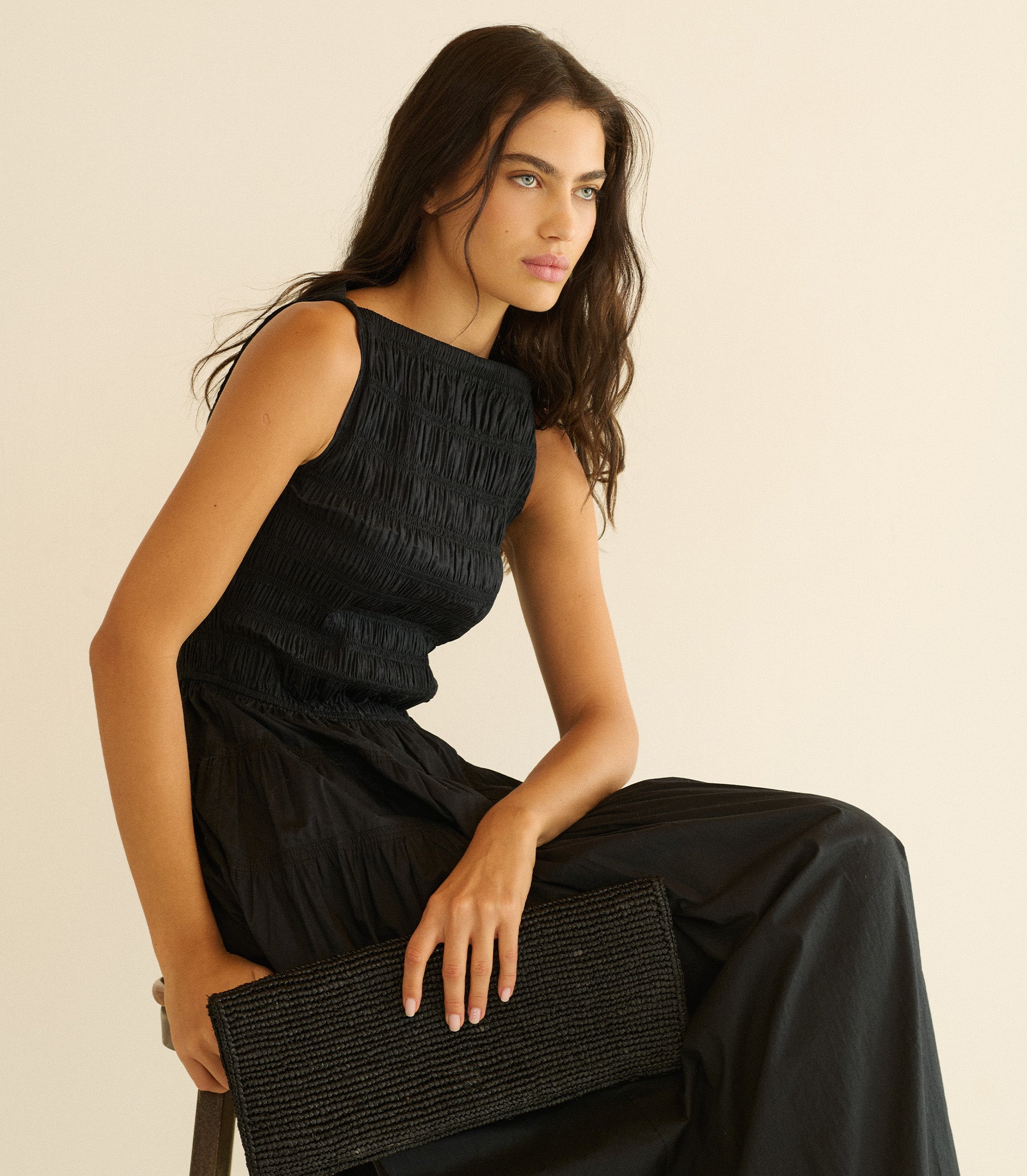 black dress clutch This Summer's Best Black Maxi Dress Worth Adding to Your Closet