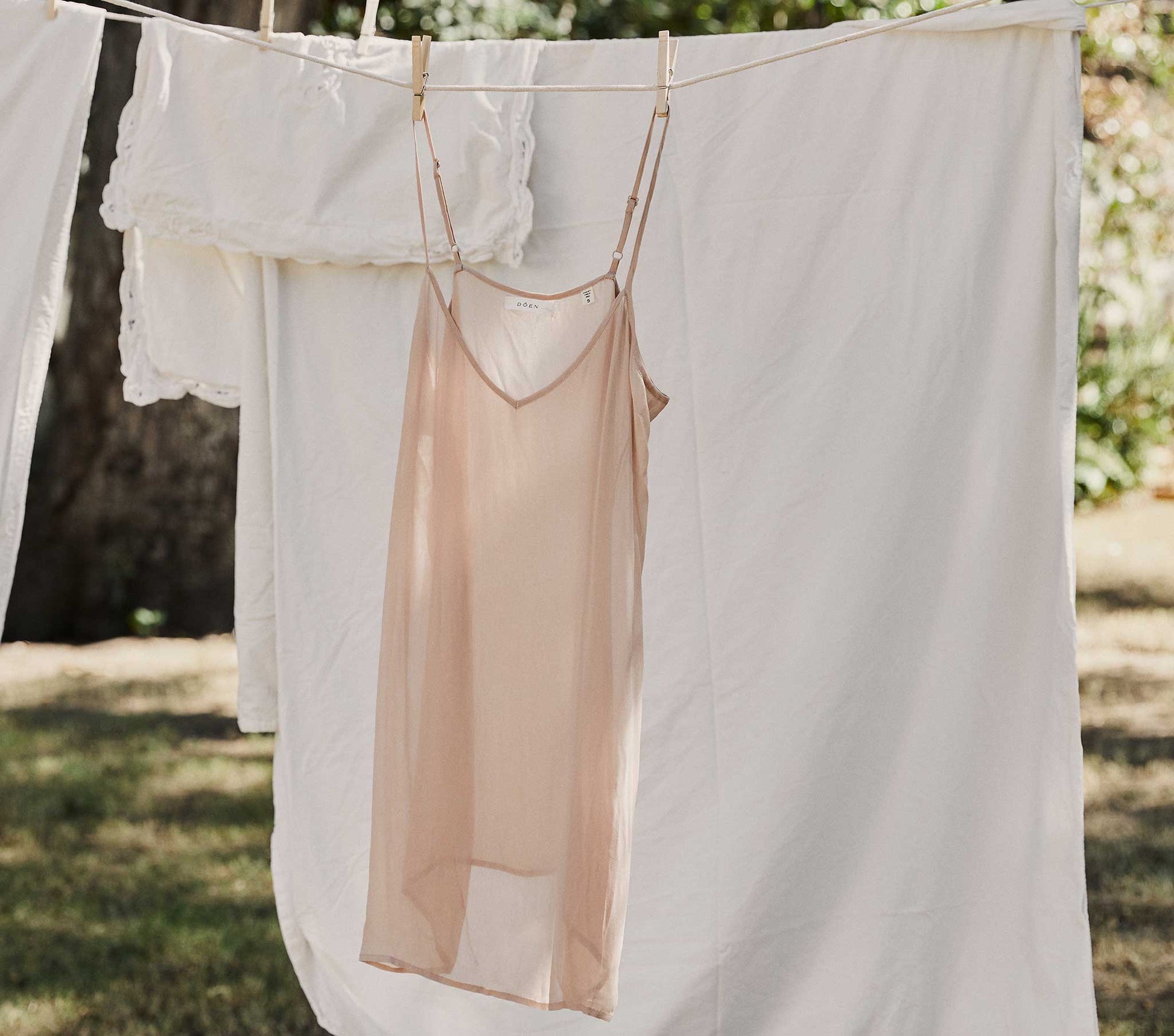 SHORT DEEP V-NECK SLIP -- CONCH view 1
